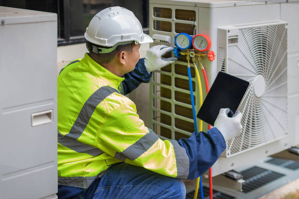 Professional Hvac Installation technician working in Harned, KY